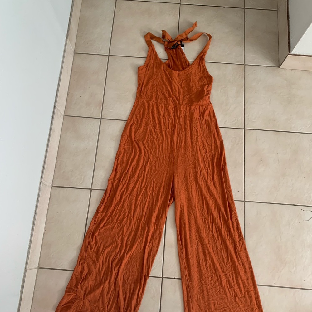 Burnt orange jumpsuit. Great color